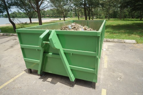 Segregated bins for recyclable and hazardous waste during clearance